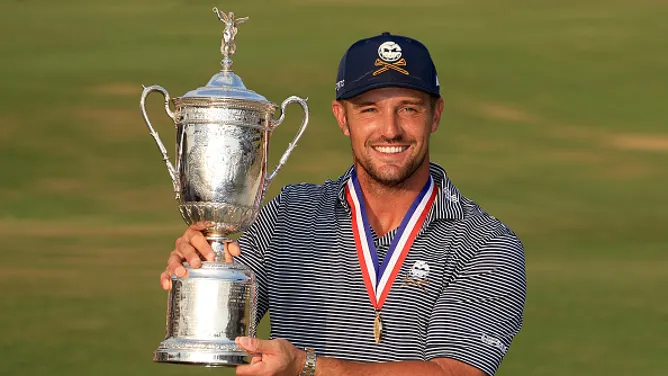 The U.S. Open champion claims he was forced to pay $2 million after winning